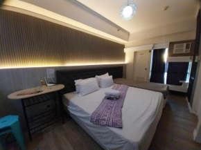 Tagaytay Prime Residences Partial Taal View w WiFi Netflix Pool Cooking